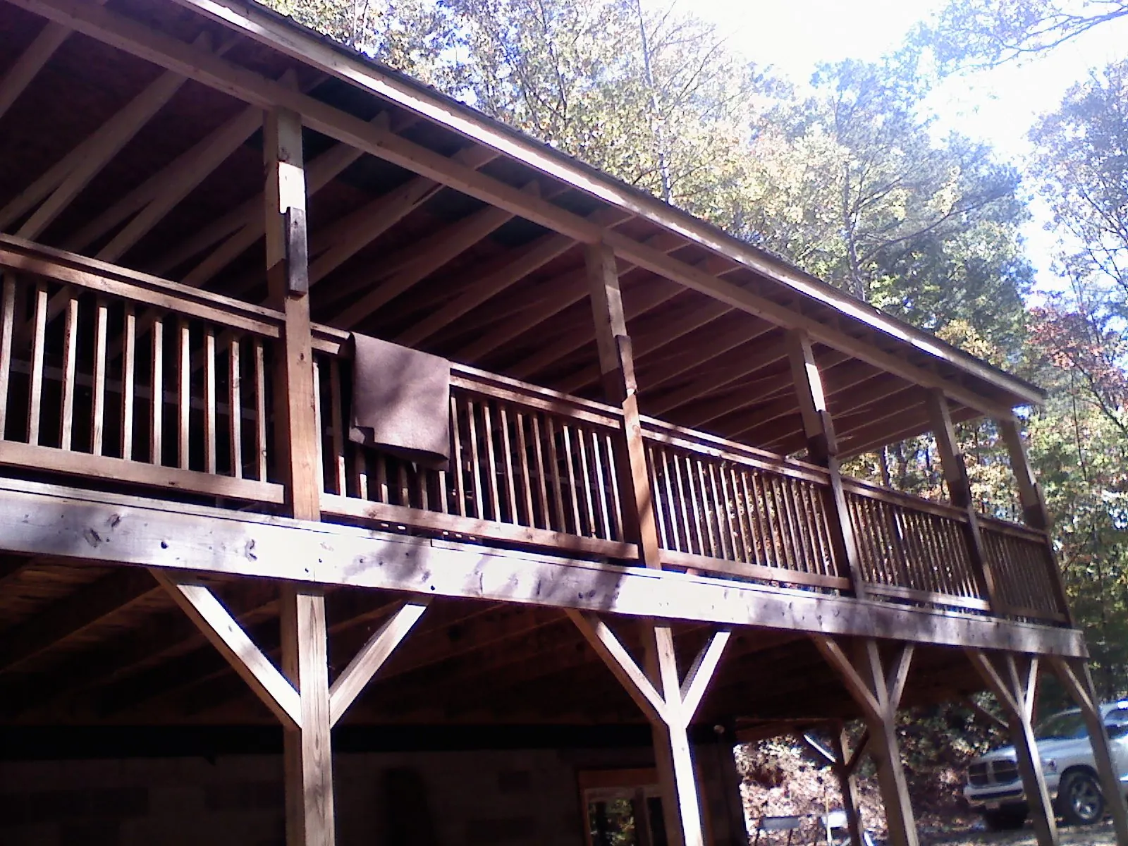 Timber framing under a new elevated porch and deck — Roof Leak Repair in West Memphis by Roofing Brothers